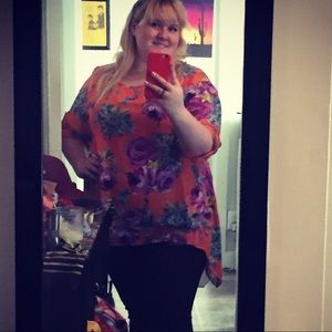 Flowy orange flowered blouse
